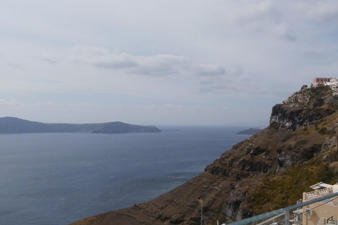 6 hours Private Full Santorini Highlights - Oia main street: charm, cliffs, and real people energy