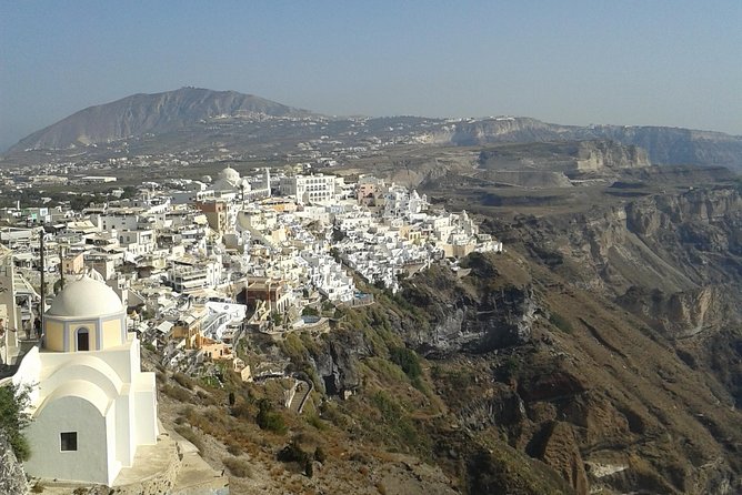 Amazing sightseeing in Santorini - Stop 4: Perivolos Black Sand Beach and the Perivolos-Perissa Walk