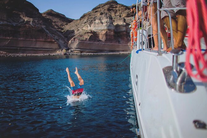 Beautiful Day Catamaran Caldera Cruise incl. Meal & Drinks - Stop 2 Continued: Volcanic Red Beach for a Snorkel and Swim Reset