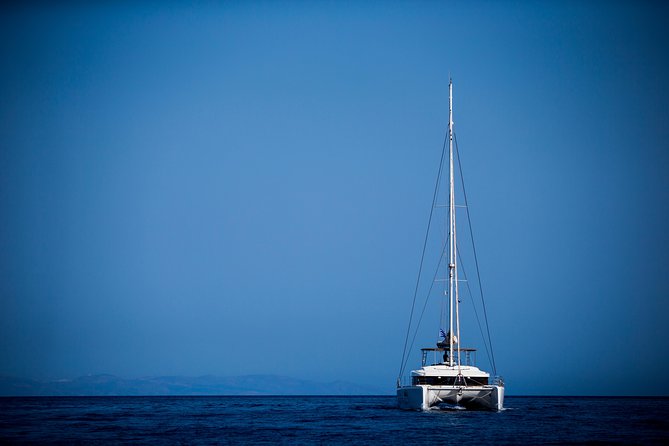 Beautiful Day Catamaran Caldera Cruise incl. Meal & Drinks - Stop 1: Volcano Views and the Hot Springs Swim That Sets the Tone