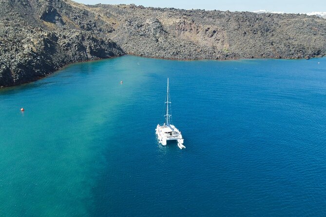 Best of Santorini Private Half-Day Catamaran Cruise with transfer and meal - Hotel pickup and the Vlichada start: quick and low-stress