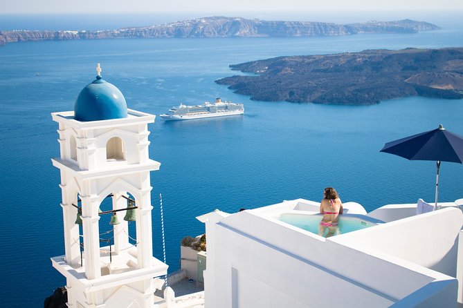 Blue Dome And Oia Sunset Small Group Transfer - First stop: Firostefani’s Blue Dome for quick, iconic photos