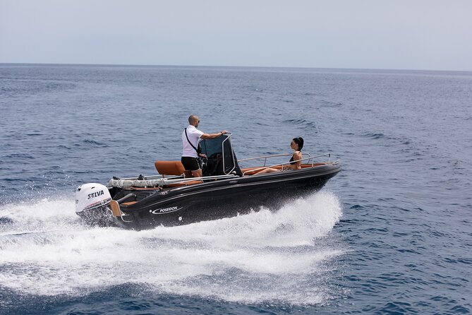 Boat Rental in Santorini License Free - What you can realistically do: swims, music, shower, and comfort wins