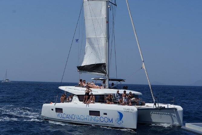 Caldera Cruise with Swim Stops, BBQ on board and drinks! - Pickup, drop-off, and the small-group advantage