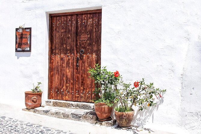 Discover the Cultural Heart of Santorini with Mεliton Tours - Pyrgos: old roads, a castle story, and church views that reward early exploring