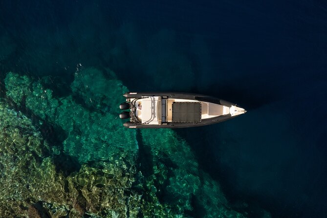 Exclusive cruise experience in Santorini - Stop 3: Palea and Nea Kameni volcanic islands and hot-springs time
