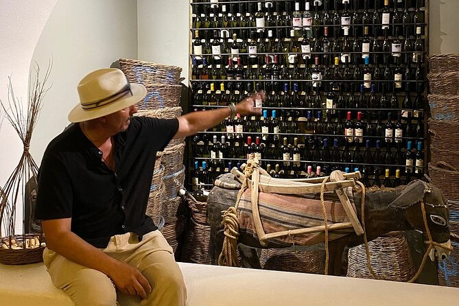 Experience Santorini Award-Winning Wineries with Sunset & snacks. - Sunset at the Three Bells of Fira: the payoff moment