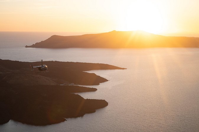 Experience Santorini Sunset by Helicopter - Akrotiri From the Sky: Red Cliffs and Ancient Footprints