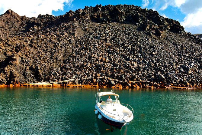 Explore Santorini and its volcanic wonders with Alex Private Boat - Stop 2: second volcanic swim zone, clear water and volcano views