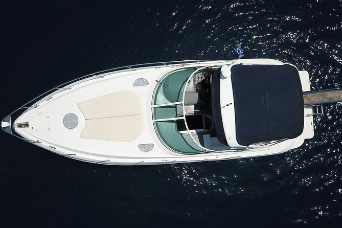 Explore Santorini’s volcano with Alex Private Boat Rental - Fira Old Port meeting point, tender timing, and why it matters