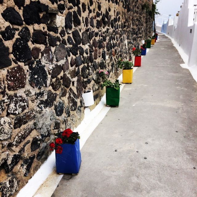 Fira: Guided Foodie Walking Tour with Tastings - The caldera-view midday meal: where you slow down and eat well