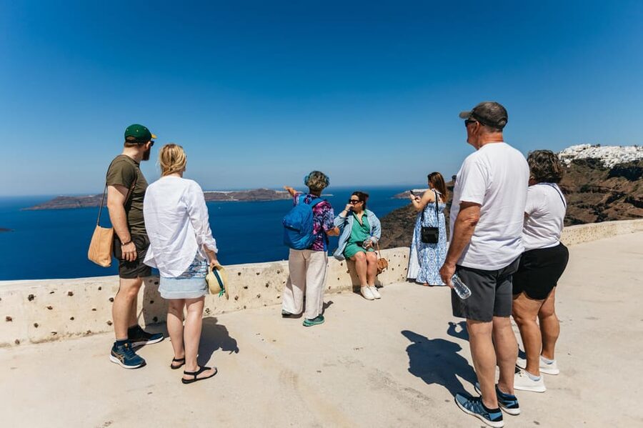 Fira: Guided Foodie Walking Tour with Tastings - The caldera-edge path: walking with volcano and sea in view