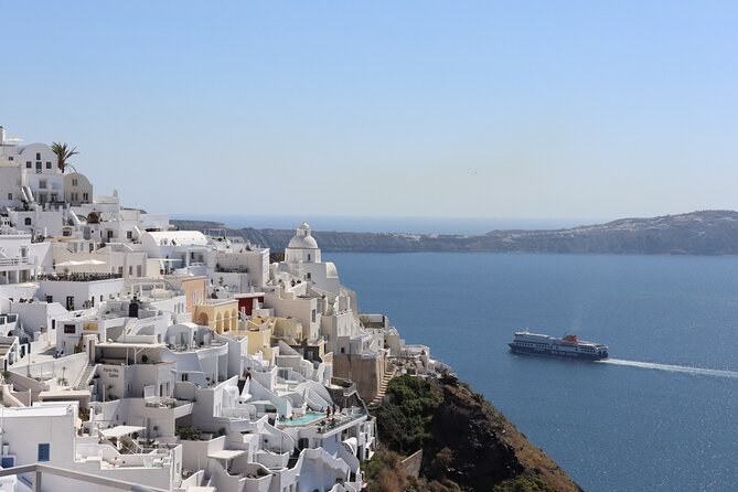 Fira Walking Tour: Explore Top Sights & Hidden Gems - Stop by stop in Fira: churches, bells, and a panoramic caldera view
