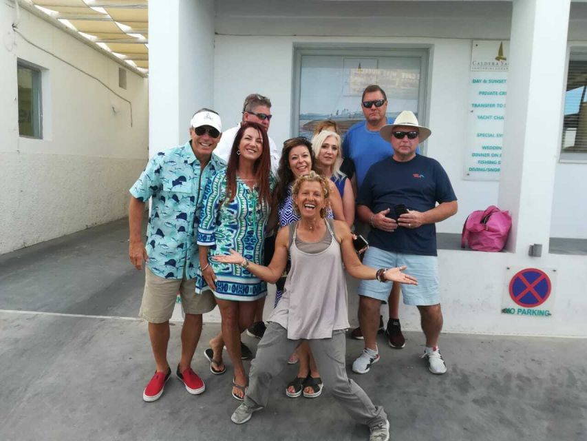 Fira: Walking Tour with Cable Car Ride - Gold Street, jewelry windows, and donkey roads that still feel functional