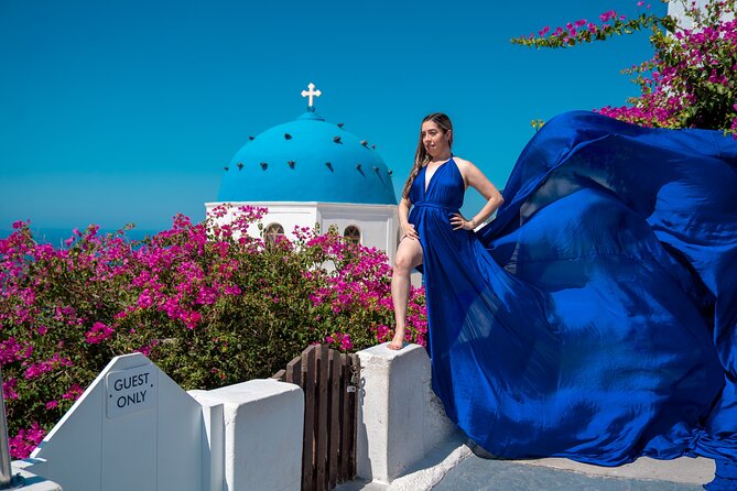 Flying Dress Photoshoot in Oia Private entry to Blue Dome - Meeting point and getting to the Blue Dome without stress