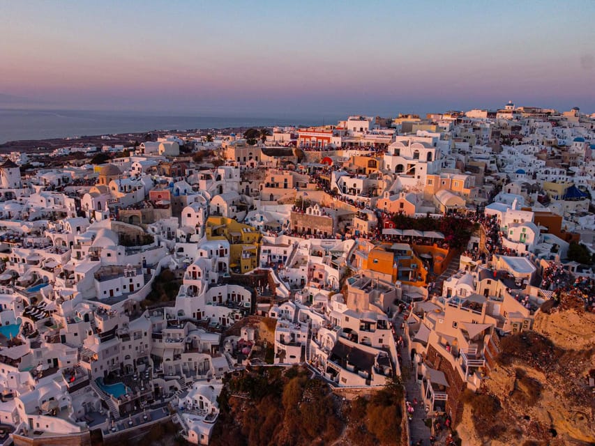 From Fira: Santorini Highlights Minibus Tour with Oia Sunset - Megalochori village: whitewashed charm plus a taste of cave-housing life