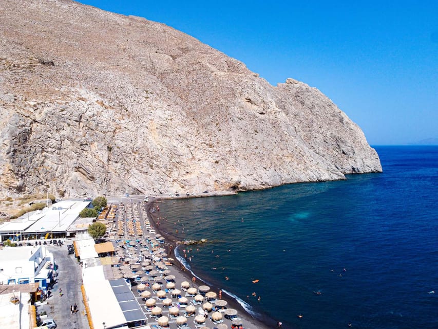 From Fira: Santorini Highlights Minibus Tour with Oia Sunset - Firostefani blue domes: a short walk with iconic caldera views