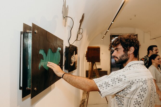 Guided Art Tour Contemporary Art Meets a Quiet Santorini Village - One hour, one stop, and a private group format