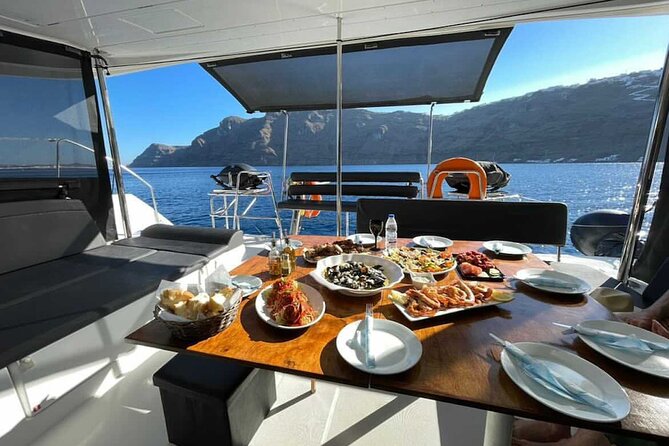 Half Day Premium Catamaran Cruise in Santorini including Oia - The big idea: a Santorini catamaran cruise that works as a best-of