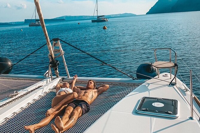 Half Day Premium Catamaran Cruise in Santorini including Oia - Food and drinks on board: BBQ dinner plus open bar