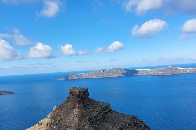 Hiking activity through the volcanic land of wonder - Skaros and the Cave-House Shapes That Explain Santorini