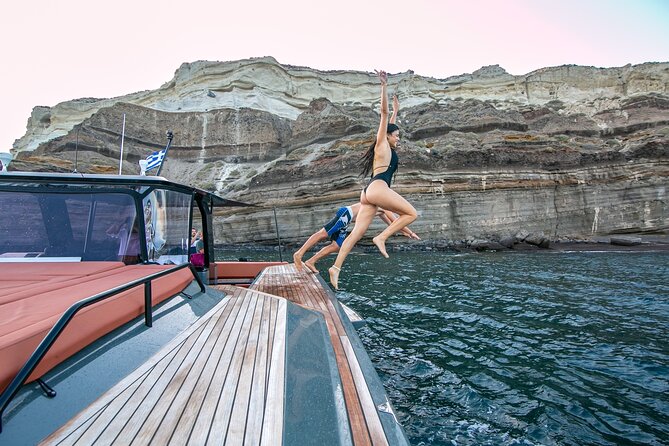 Luxury Private Power Catamaran Tour in Santorini - Stop 1: Amoudi Bay and the first look at Santorini from sea level