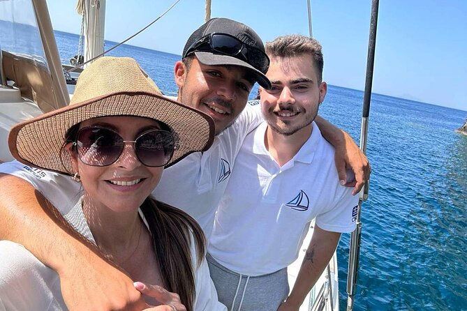 Luxury Santorini Sunset Cruise: Dinner, BBQ, Open Bar, Transfers - Your Route: Red Beach, White Beach, Indian Rocks, and Akrotiri Lighthouse