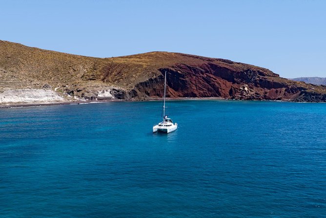 Morning Caldera Cruise with BBQ Meal and Drinks - Morning pickup on a catamaran built for lounging