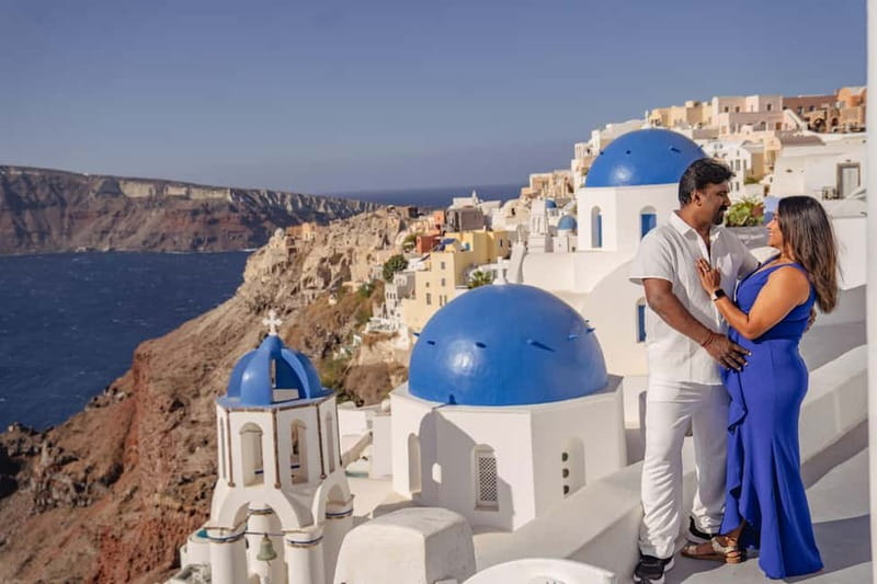 Oia: Couple Photoshoot Seprate Entrance to Blue Dome - Why a Private Oia Photoshoot Beats DIY Photo Hunting