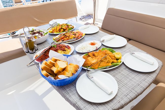 Premium Small-Group Catamaran Cruise with BBQ, Open Bar, Transfer - Mesa Pigadia: your first real swim or chill moment