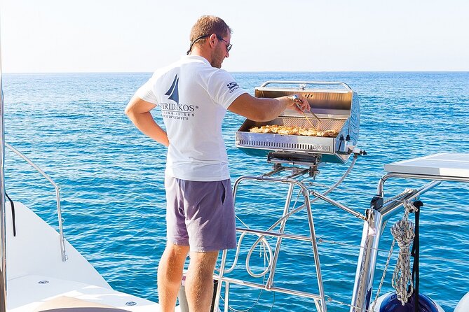 Premium Small-Group Catamaran Cruise with BBQ, Open Bar, Transfer - Palea Kameni hot springs: natural spa, real open-water requirement