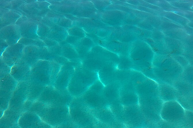 Private boat tour in Santorini with lunch or dinner in Therasia - Swimming and snorkeling in the caldera: plan your sea legs