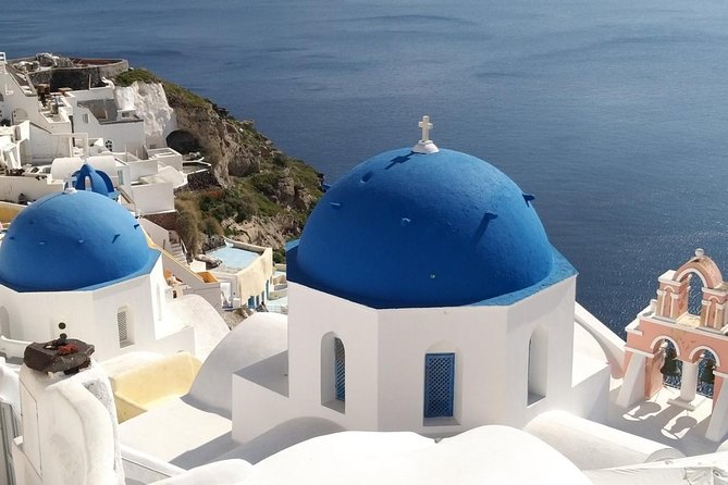 Private Classic Santorini Panorama: Visit the most popular destinations! - Oia Main Street: blue domes, cliff views, and where to stand