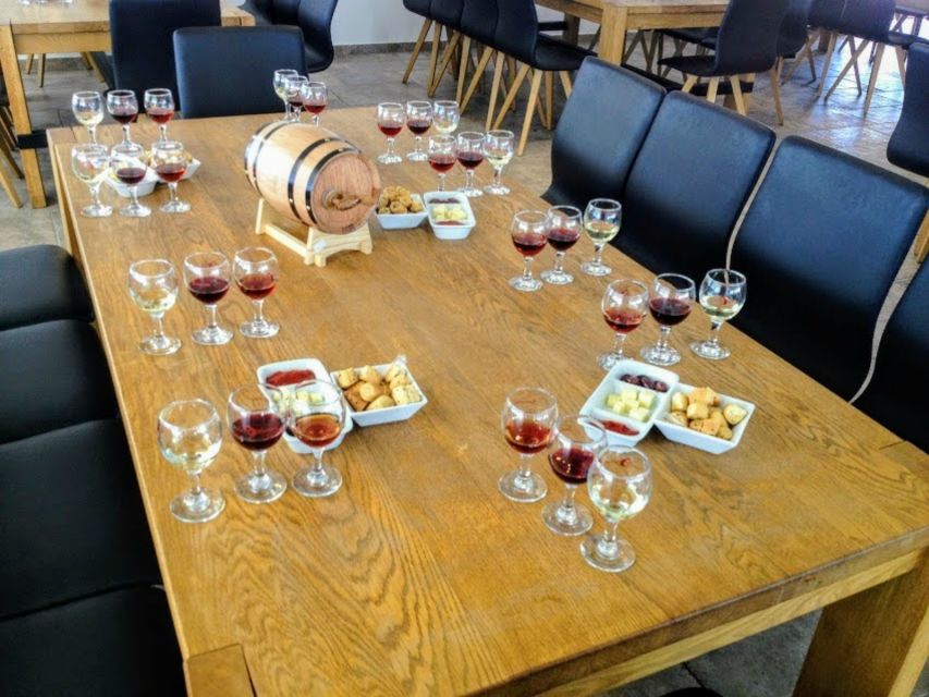 Private Group Visit to Akrotiri & 3 Wineries with Tastings - Picking Up and Getting Around: Vans, Timing, and Small-Group Comfort