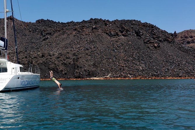 Private Luxury Caldera Cruise with a rich BBQ meal and Open Bar! - Snorkeling equipment and swim stops: the best part of the day