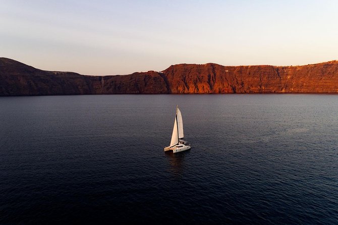 Private Luxury Caldera Cruise with a rich BBQ meal and Open Bar! - Crew and safety: why Captain John and George make the trip feel smooth