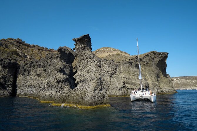Private Luxury Santorini Catamaran Cruise with Port Pickup - Price and value: paying for privacy, stops, and onboard service