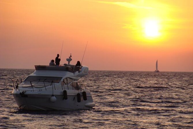 Private Motor Yacht Cruise with BBQ, Open Bar & Transfers - Thirassia and Saint Nicolas chapel for a different island feel