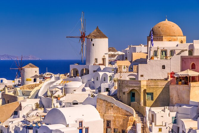 Private Oia Panoramic Scenes: Embrace the most picturesque village of Santorini! - Stop 1: Three Bells of Fira (Firostefani) and that postcard balcony feeling