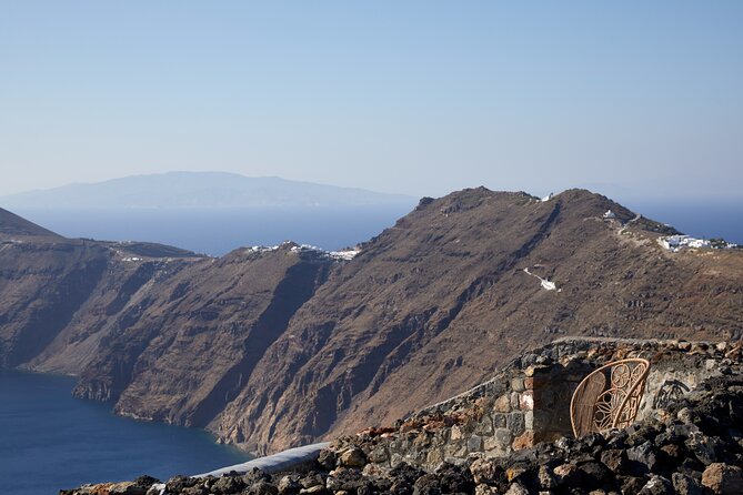 Private Romantic Sunset Dinner with Caldera views in Santorini - Wine cellar visit and premium wine options, what is included vs added