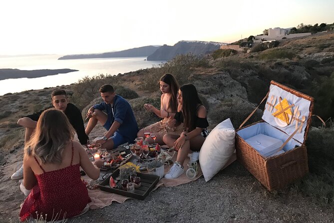 Private Santorini Sunset Picnic Experience - The picnic setup: typical Greek bites, wine included, and a comfy atmosphere