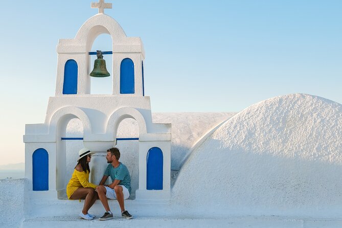 Professional Photoshoot at Oia Village Santorini - The Oia walk: icons, churches, blue domes, and cliffside viewpoints
