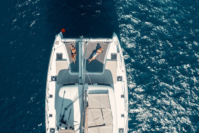 Romantic Sunset Catamaran Caldera Cruise incl. Meal & Drinks - Comfort and logistics at sea: seasickness, shade, and getting on and off