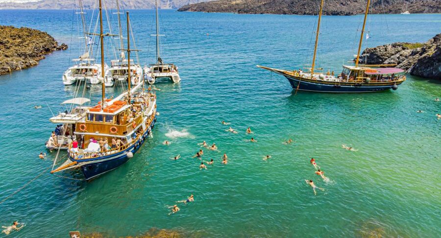 Santorini 2-Day Combo: Volcano Boat Cruise & Island Bus Tour - What to pack: shoes and sun matter more than you think