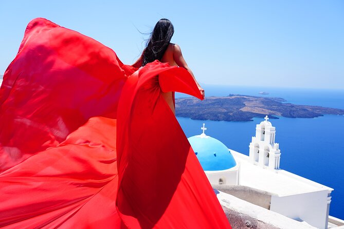 Santorini 2h Private Flying Dress Photoshoot with Transportation - The flying-dress magic comes from the assistant, not the wind alone