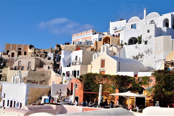 Santorini 5 Hour Private Oia Tour & Lunch/Dinner at a Local Farm - Oia Main Street: cobblestones, white houses, and Caldera sightlines