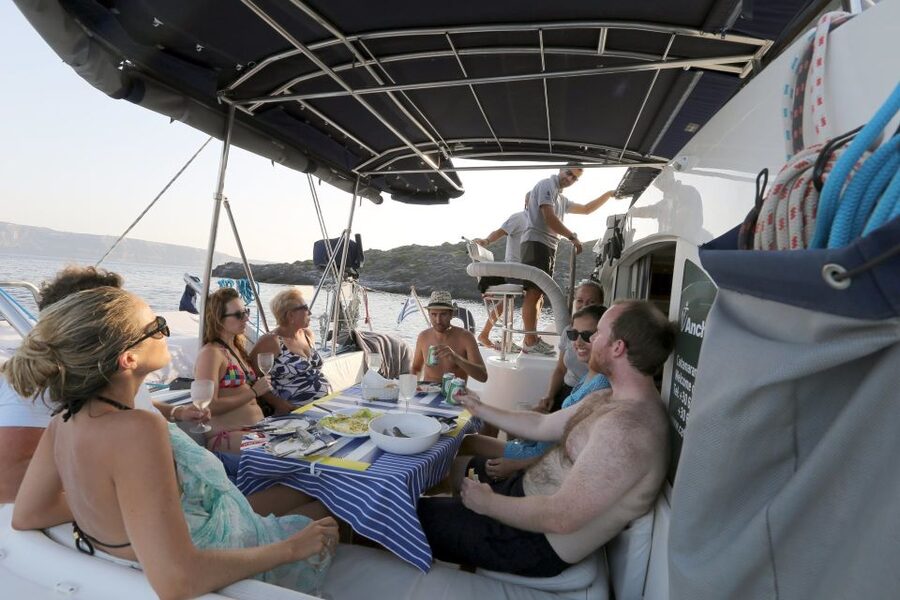 Santorini: 7-Hour Private Catamaran Cruise with Food & Drink - Captain and crew flexibility: asking for route changes