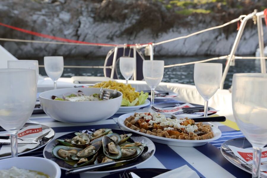 Santorini: 7-Hour Private Catamaran Cruise with Food & Drink - Thirassia and Oia from the water: where the day changes gears