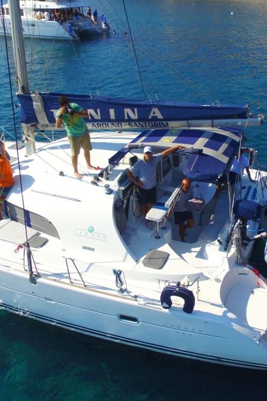 Santorini: 7-Hour Private Catamaran Cruise with Food & Drink - Timing and pickup: an afternoon start from Thera to Vlychada