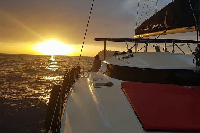 Santorini: Adventurous Catamaran Experience with Snorkeling - Sailing near Akrotiri Lighthouse, without the hiking